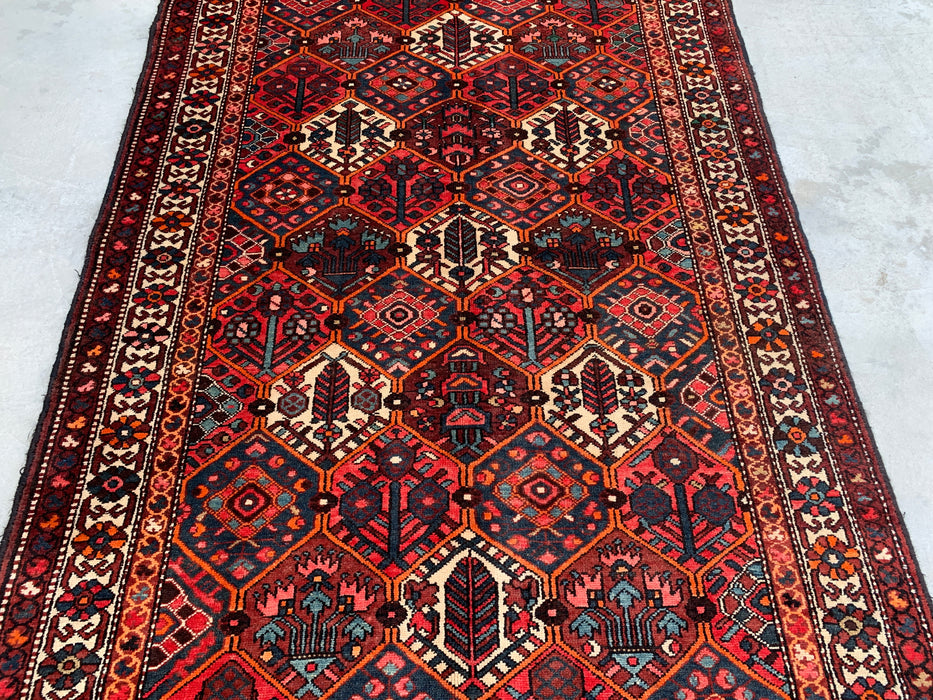 Handgemaakt Perzisch wollen vloerkleed 7x10 - Rood geometrisch tribaal Perzisch stijl kleed met ivoorkleurige rand - Exacte afmeting 9'10" x 5'3" - KBHM-835