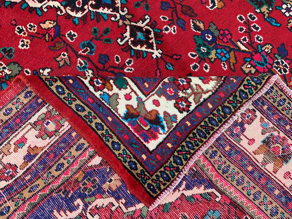 Handgemaakt Perzisch wollen vloerkleed 7x10 - Rood Perzisch tapijt met bloemenmedaillon en ivoorkleurige rand - Exacte afmeting 10'1" x 6'11" - KBHM-836
