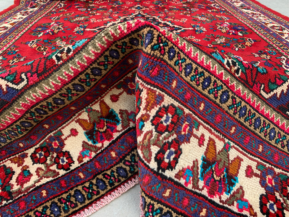 Handgemaakt Perzisch wollen vloerkleed 7x10 - Rood Perzisch tapijt met bloemenmedaillon en ivoorkleurige rand - Exacte afmeting 10'1" x 6'11" - KBHM-836