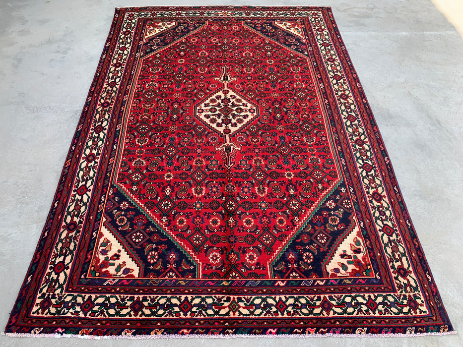 Handgemaakt Perzisch wollen vloerkleed 7x10 - Rood Perzisch tapijt met geometrisch medaillon en ivoorkleurige rand - Exacte afmeting 9'10" x 6'8" - KBHM-843
