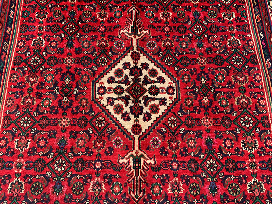 Handgemaakt Perzisch wollen vloerkleed 7x10 - Rood Perzisch tapijt met geometrisch medaillon en ivoorkleurige rand - Exacte afmeting 9'10" x 6'8" - KBHM-843