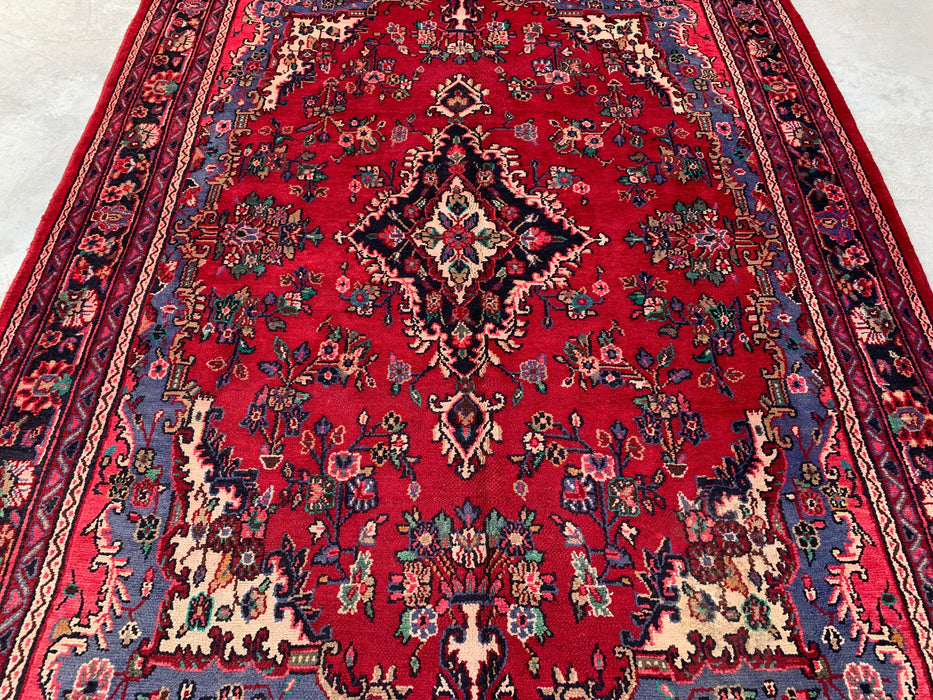 Handgemaakt Perzisch wollen vloerkleed 7x10 - Rood Perzisch tapijt met bloemmedaillon en blauwe rand - Exacte afmeting 10'2" x 7'0" - KBHM-844