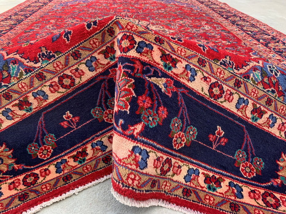Handgemaakt Perzisch wollen vloerkleed 7x10 - Rood Perzisch tapijt met bloemmotief en medaillon en marineblauwe rand - Exacte afmeting 10'4" x 6'11" - KBHM-846