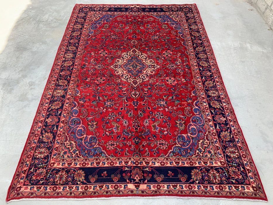 Handgemaakt Perzisch wollen vloerkleed 7x10 - Rood Perzisch tapijt met bloemmotief en medaillon en marineblauwe rand - Exacte afmeting 10'4" x 6'11" - KBHM-846