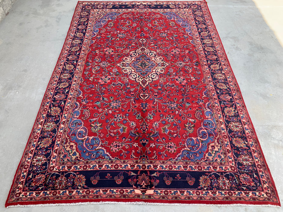 Handgemaakt Perzisch wollen vloerkleed 7x10 - Rood Perzisch tapijt met bloemmotief en medaillon en marineblauwe rand - Exacte afmeting 10'4" x 6'11" - KBHM-846