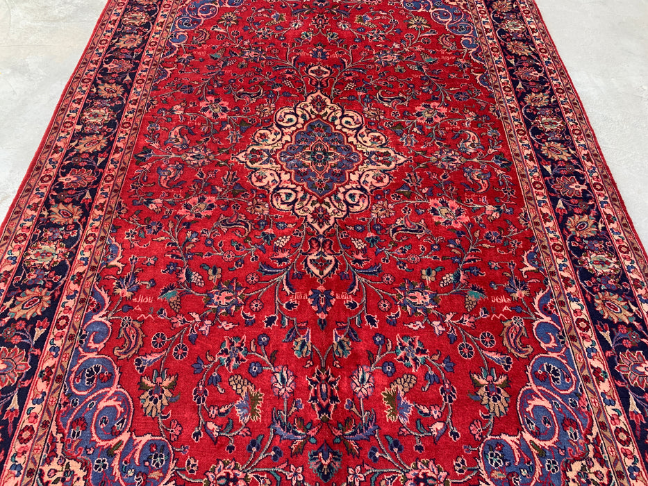 Handgemaakt Perzisch wollen vloerkleed 7x10 - Rood Perzisch tapijt met bloemmotief en medaillon en marineblauwe rand - Exacte afmeting 10'4" x 6'11" - KBHM-846