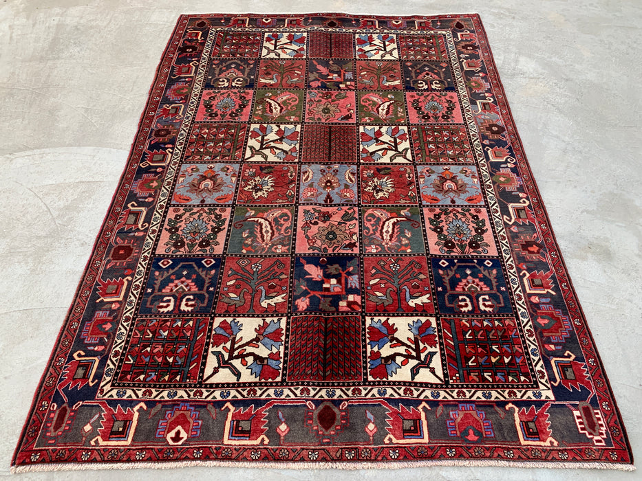 Handgemaakt Perzisch wollen vloerkleed 215x305 cm - Perzisch tapijt met rood paneel en een blauw & grijs tribale rand - Exacte afmeting 307 cm x 213 cm - KBHM-854