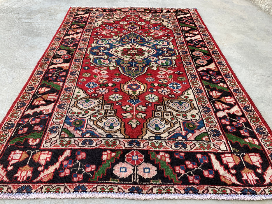 6'5 x 4'5 handgeknoopt Perzisch wollen tapijt - Rood floraal medaillonontwerp met zwarte rand - KBHM-862