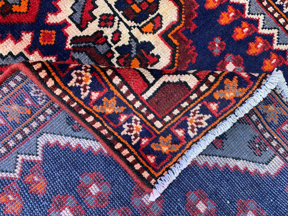 277 x 104 cm handgeknoopt Perzisch wollen loper - Marineblauw tribaal medaillonmotief met ivoorkleurige accenten - KBHM-868
