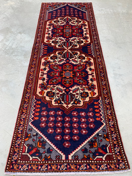 277 x 104 cm handgeknoopt Perzisch wollen loper - Marineblauw tribaal medaillonmotief met ivoorkleurige accenten - KBHM-868