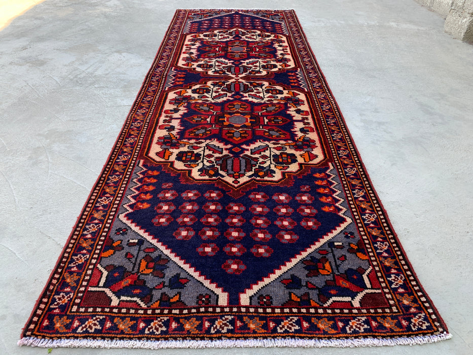 277 x 104 cm handgeknoopt Perzisch wollen loper - Marineblauw tribaal medaillonmotief met ivoorkleurige accenten - KBHM-868
