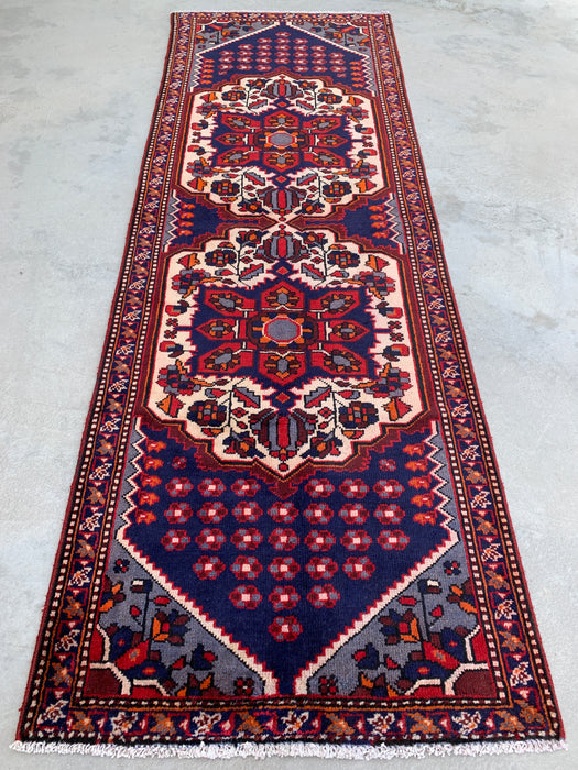 277 x 104 cm handgeknoopt Perzisch wollen loper - Marineblauw tribaal medaillonmotief met ivoorkleurige accenten - KBHM-868