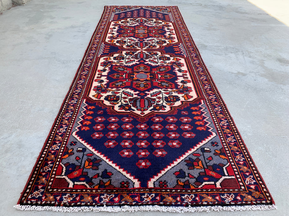 277 x 104 cm handgeknoopt Perzisch wollen loper - Marineblauw tribaal medaillonmotief met ivoorkleurige accenten - KBHM-868