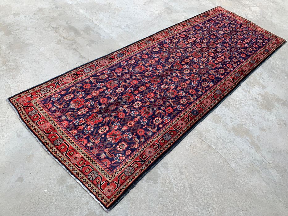 310 x 109 cm handgeknoopt Perzisch wollen loper - Marineblauw met all-over bloemmotief en rode rand - KBHM-885