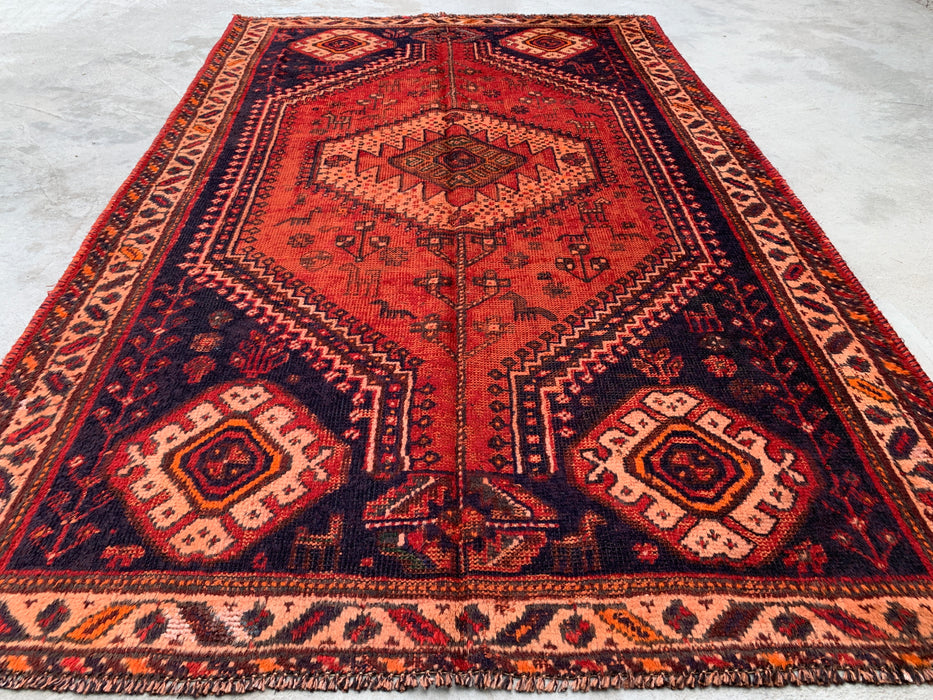236 cm x 124 cm Handgeknoopt Perzisch wollen tapijt - Roestkleurig tribaal medaillonmotief met marineblauwe accenten - KBHM-901