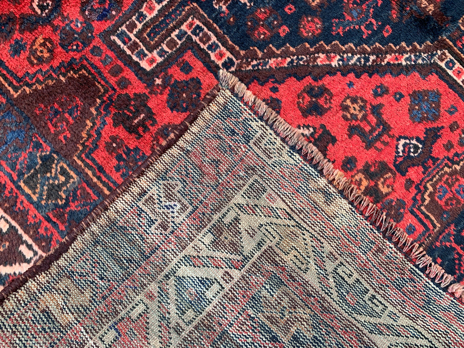 Handgemaakt Perzisch wollen vloerkleed 210x300 cm - Rood Perzisch tapijt in tribale stijl met medaillon en marineblauwe accenten - Exacte afmetingen 292 cm x 196 cm - KBHM-905