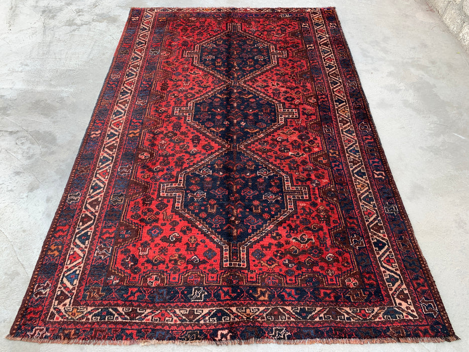 Handgemaakt Perzisch wollen vloerkleed 210x300 cm - Rood Perzisch tapijt in tribale stijl met medaillon en marineblauwe accenten - Exacte afmetingen 292 cm x 196 cm - KBHM-905