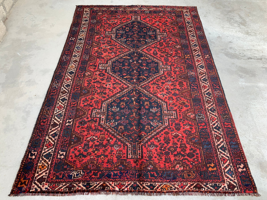 Handgemaakt Perzisch wollen vloerkleed 210x300 cm - Rood Perzisch tapijt in tribale stijl met medaillon en marineblauwe accenten - Exacte afmetingen 292 cm x 196 cm - KBHM-905