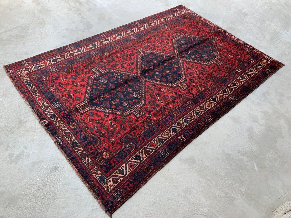 Handgemaakt Perzisch wollen vloerkleed 210x300 cm - Rood Perzisch tapijt in tribale stijl met medaillon en marineblauwe accenten - Exacte afmetingen 292 cm x 196 cm - KBHM-905