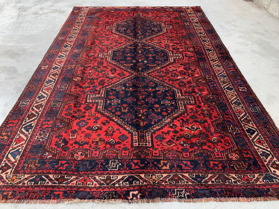 Handgemaakt Perzisch wollen vloerkleed 210x300 cm - Rood Perzisch tapijt in tribale stijl met medaillon en marineblauwe accenten - Exacte afmetingen 292 cm x 196 cm - KBHM-905