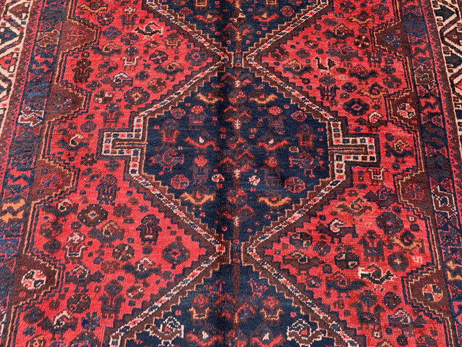 Handgemaakt Perzisch wollen vloerkleed 210x300 cm - Rood Perzisch tapijt in tribale stijl met medaillon en marineblauwe accenten - Exacte afmetingen 292 cm x 196 cm - KBHM-905