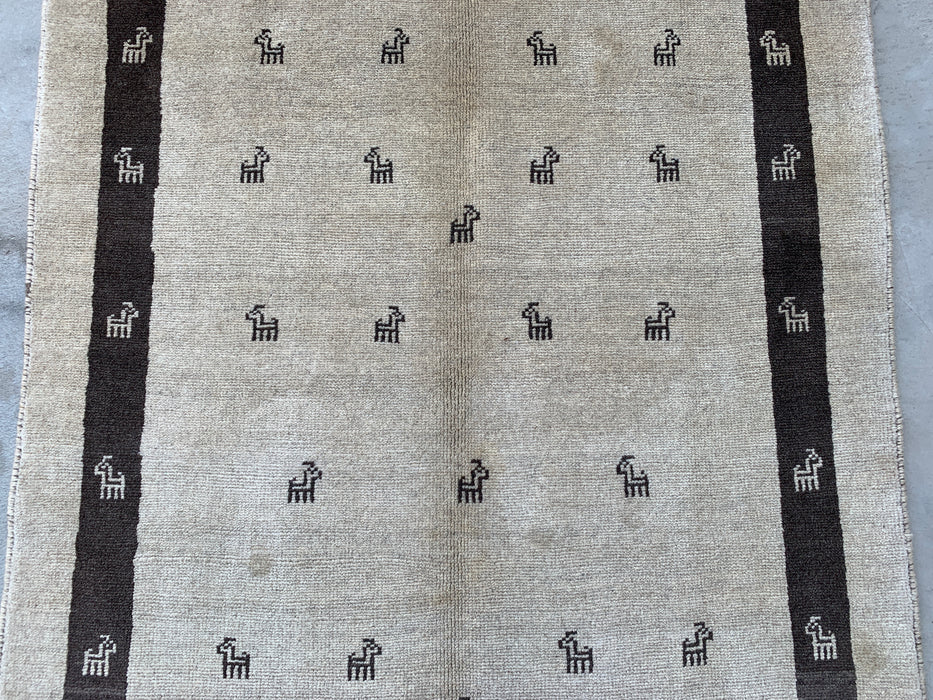165 x 119 cm handgeknoopt Perzisch wollen vloerkleed - Ivoor met minimalistisch diermotief - KBHM-951