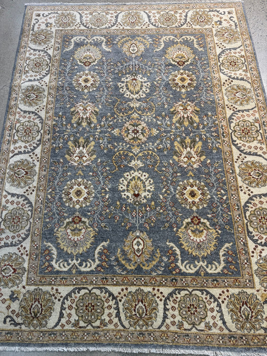 5'0" × 8'0" Handgeknoopt Chobi wollen tapijt – Marineblauw met groene & ivoorkleurige rand