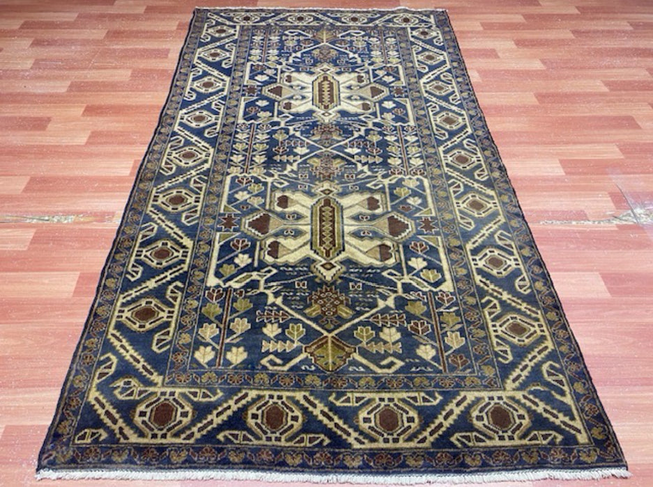 114 cm x 203 cm Handgeknoopt tribaal wollen vloerkleed – marineblauw & beige geometrisch patroon
