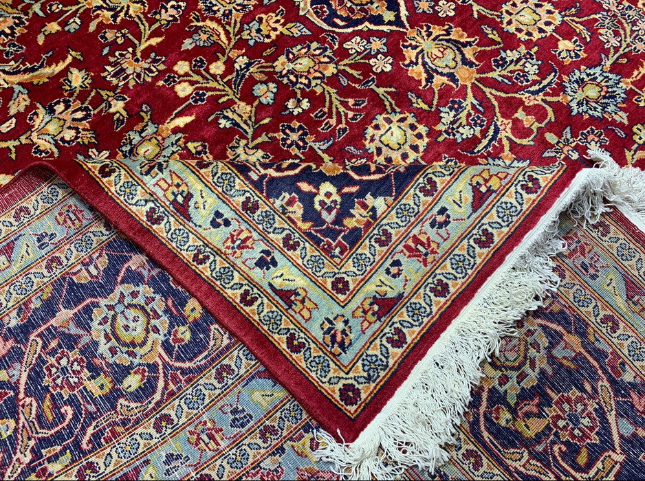 9'6" × 13'10" Handgeknoopt Perzisch wollen tapijt – Rood veld met marineblauwe & ivoorkleurige bloemenrand