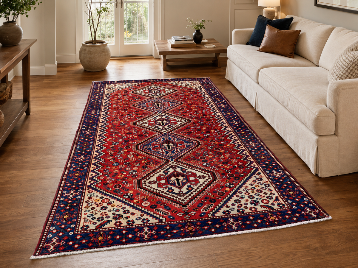 9'10" x 5'4" Handmade Persian Wool Rug styled in a room