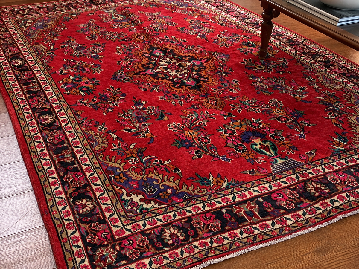 Handgemaakt Perzisch wollen vloerkleed 7x10 styled in a room
